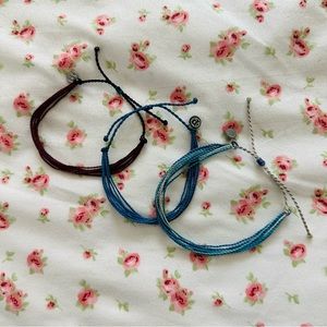 three pura vida bracelets